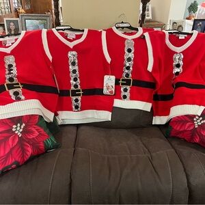 NWT set of 4 Santa sequence sweater vests